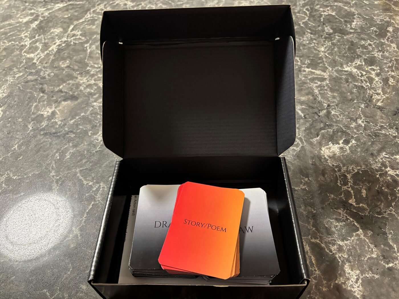 The Writing Forever Darkness card game box, opened